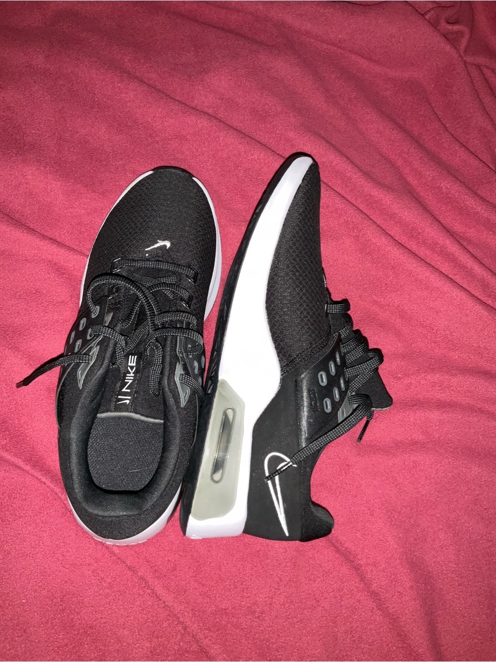 Nike Women's Black and White Air-Cushioned Sneakers